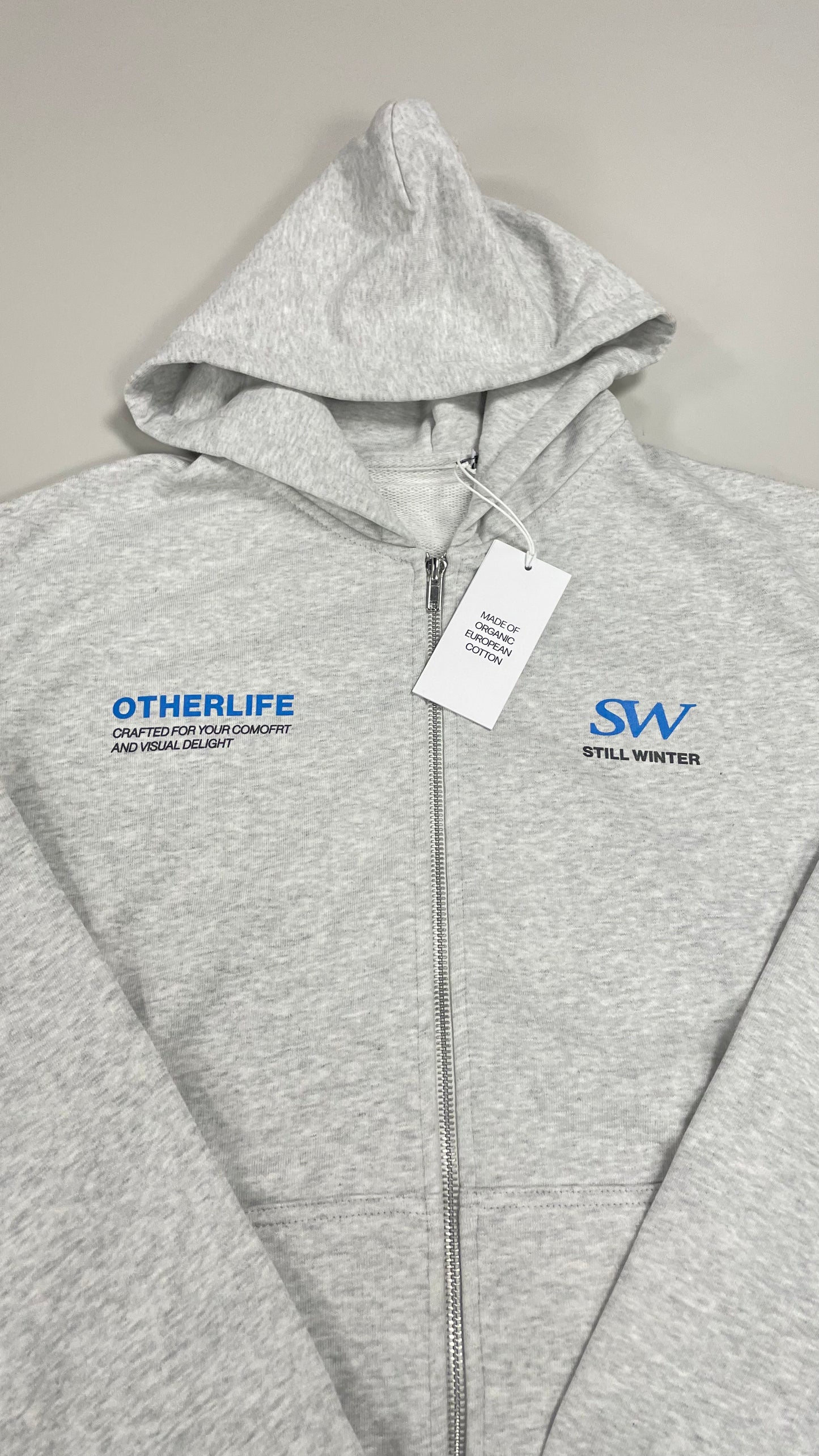 Still Winter light grey zip hoodie